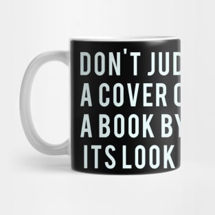 Don't Judge a cover of a book by it's look Mug